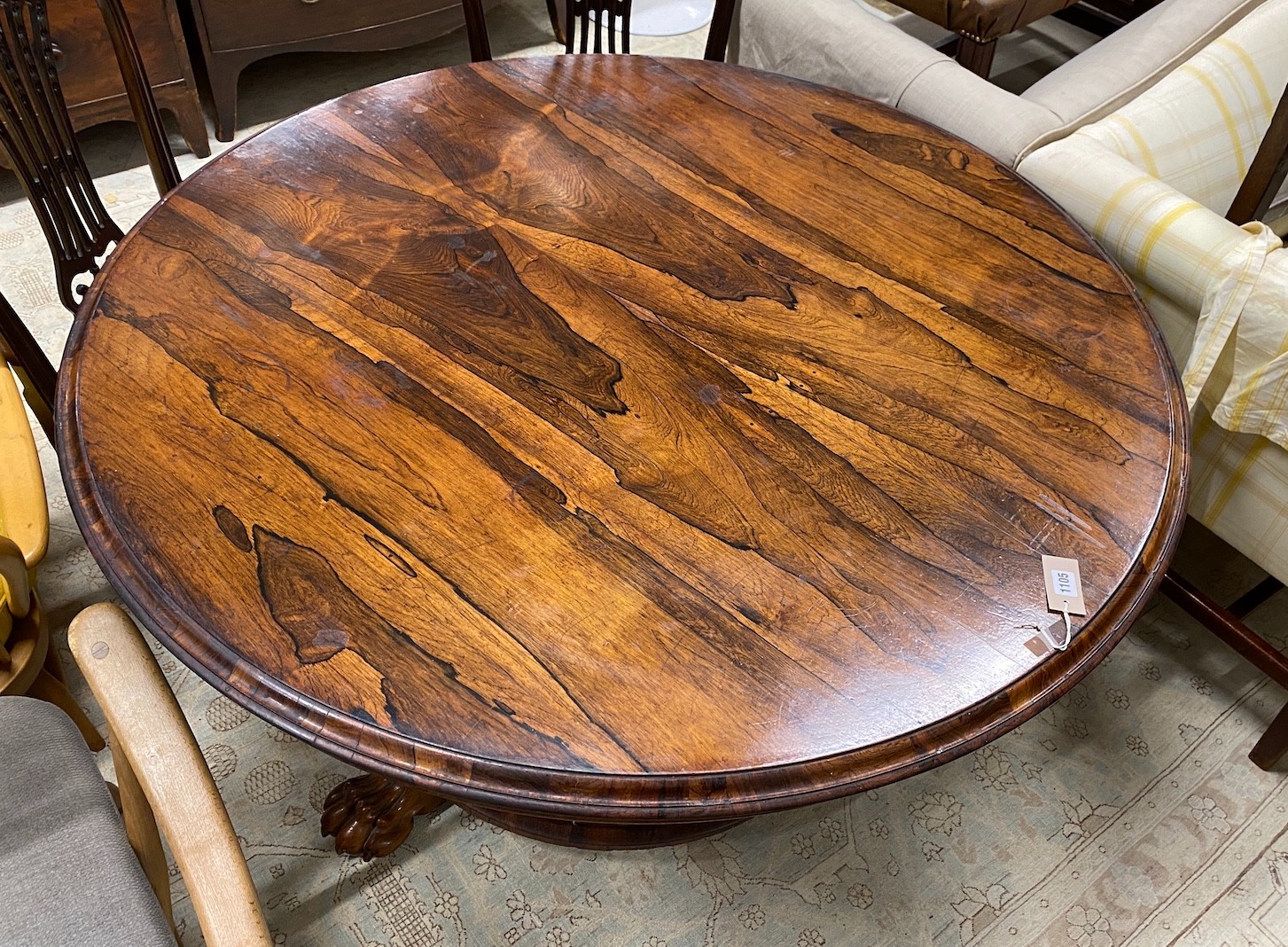 An early Victorian circular rosewood tilt top breakfast table, diameter 130cm, height 70cm